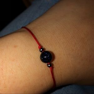 Red adjustable blue stone and hematite bracelet